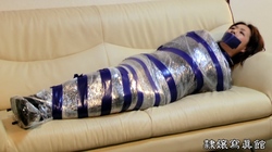 Confinement and Tying - A Noisy Woman - Wrapped and Tapegagged 